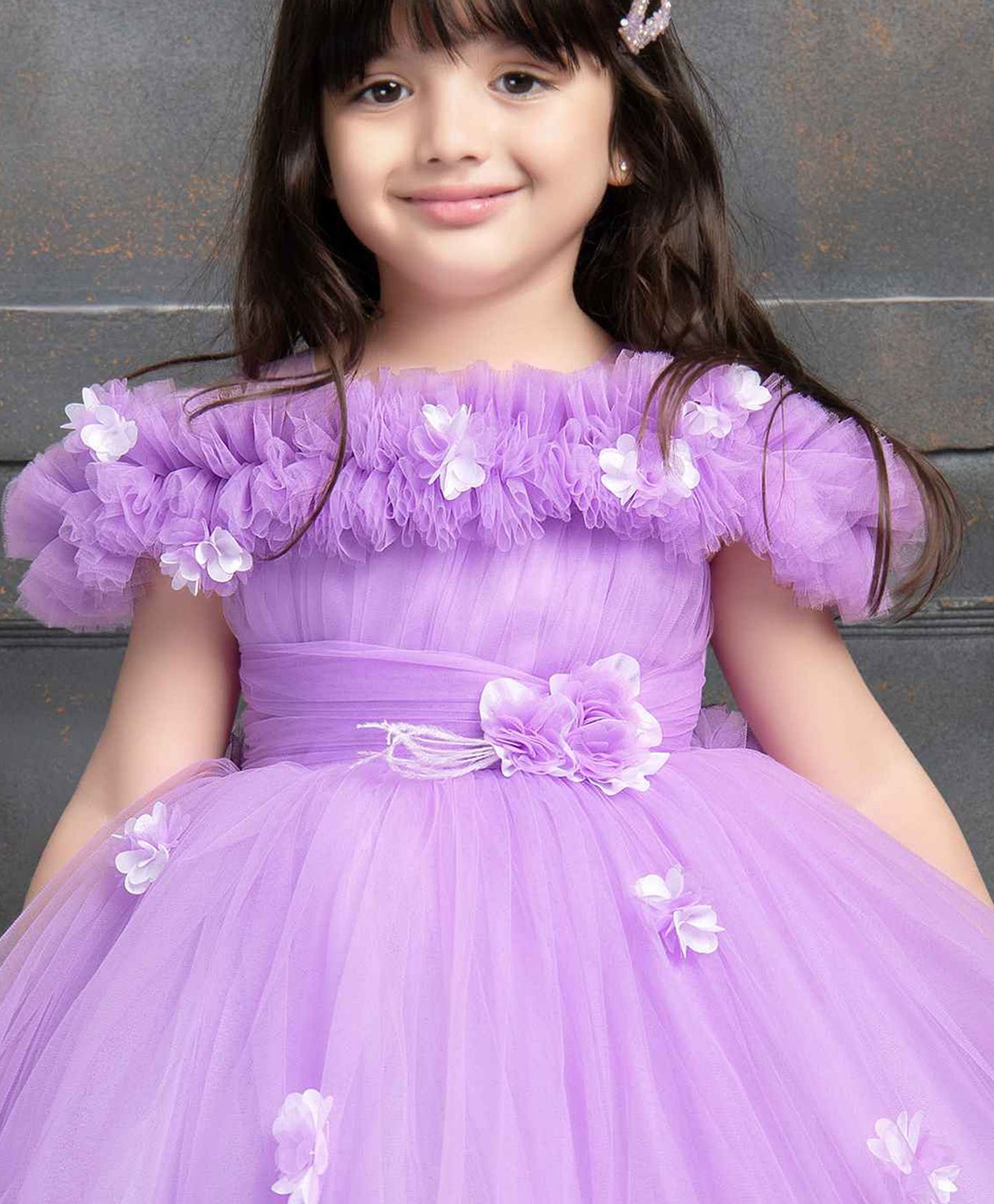 Purple Ruffled Net Tailback Frock With Floral And Butterfly Embellishment For Girls